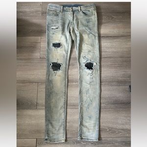 Mnml distressed patched jeans
